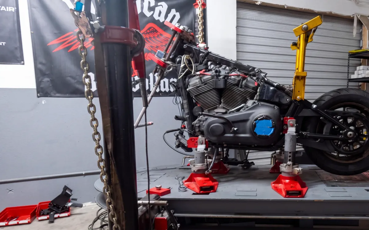 Harley-Davidson frame being straightened on the frame rack at Phoenix Performance Alignment in Phoenix